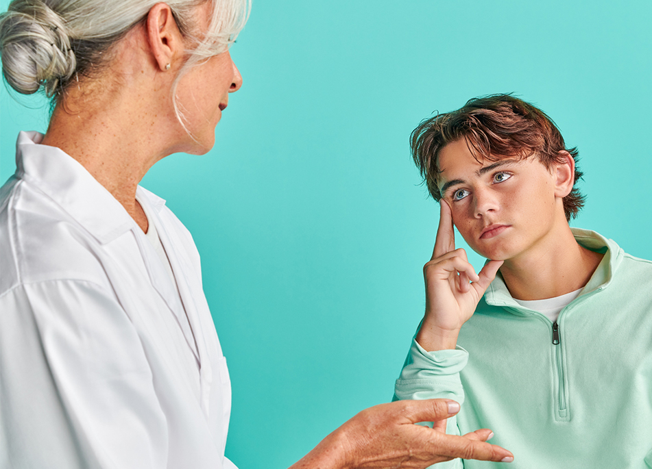 Woman mental health professional providing guidance to a young male patient